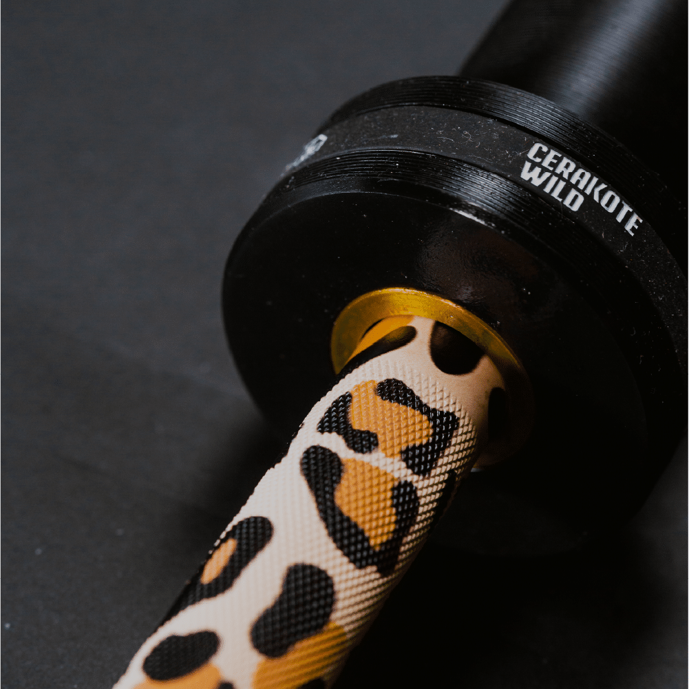Barra con Pesas Leopard Wild